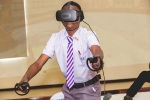 A Boy in Uniform wearing a VR headset